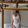 Біла пляжна туніка з тонкої в"язки з бахромою 138241111 Ghazel фото - Luxbikini